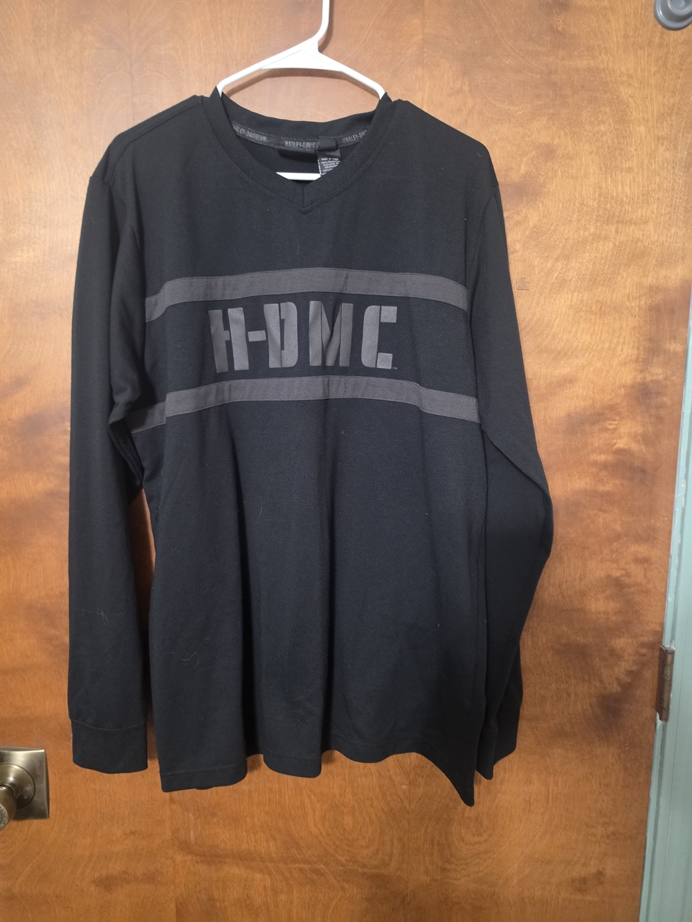 Men's black Harley-Davidson shirt neckline